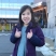 Addison standing outside BCCH giving thumbs up.
